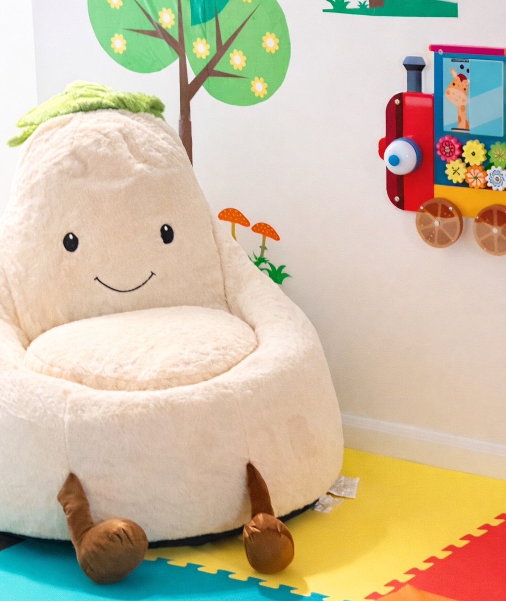 Cozy reading and play corner with colorful floor mats
